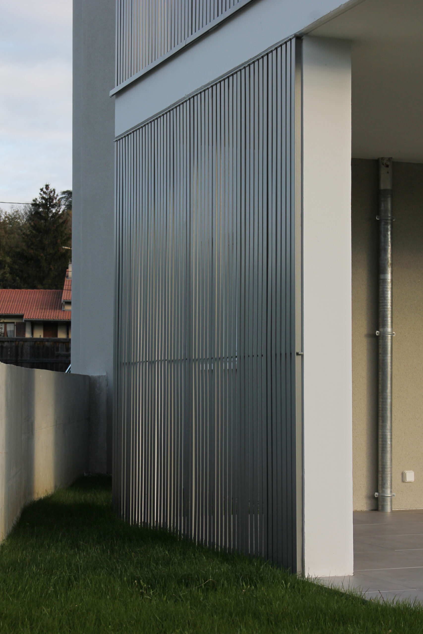 Photo de détail d'un immeuble d'habitation de 12 logements à Davézieux par Archipolis, architectes à Annonay et Grenoble
