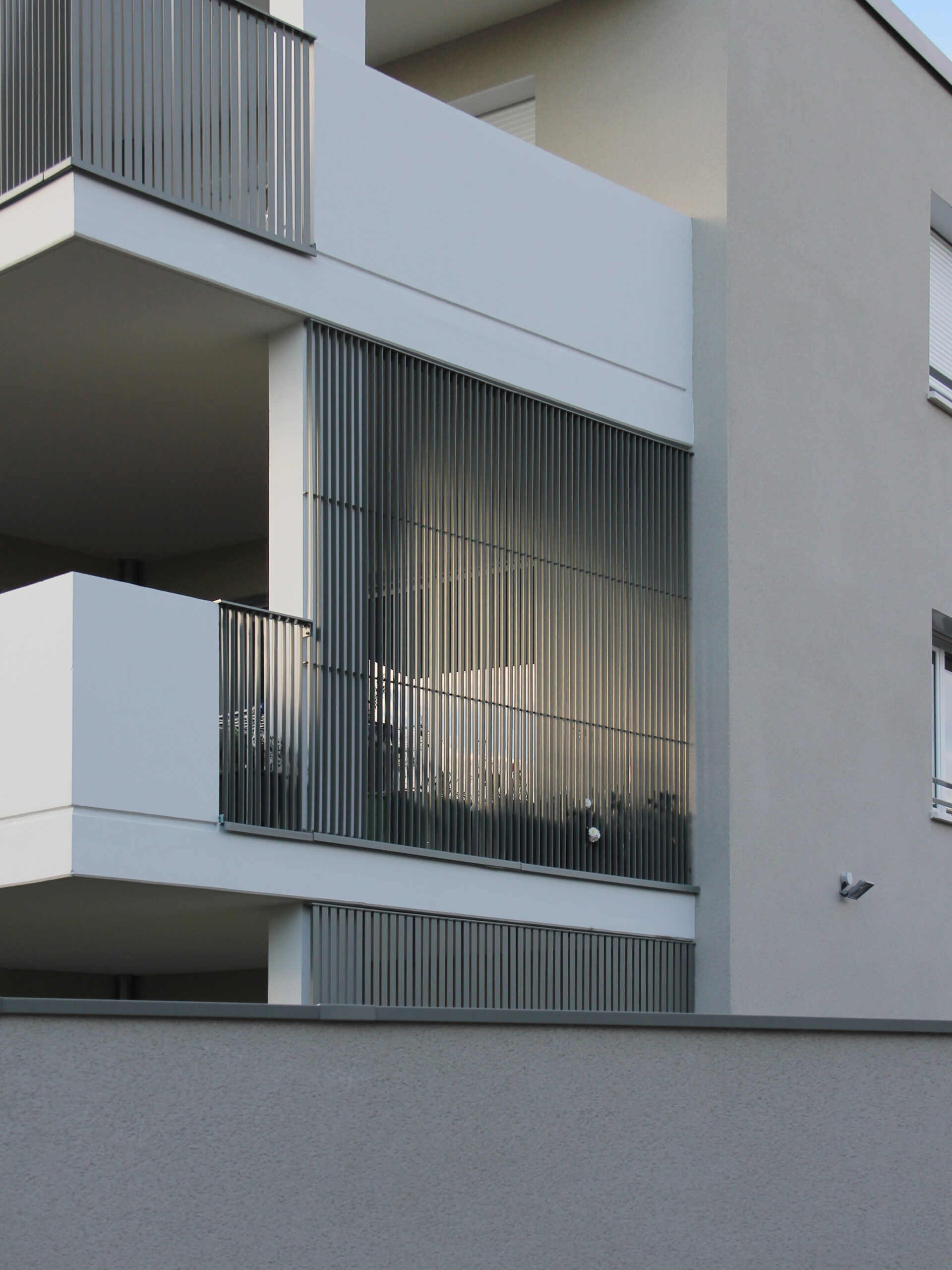 Photo de détail d'un immeuble d'habitation de 12 logements à Davézieux par Archipolis, architectes à Annonay et Grenoble