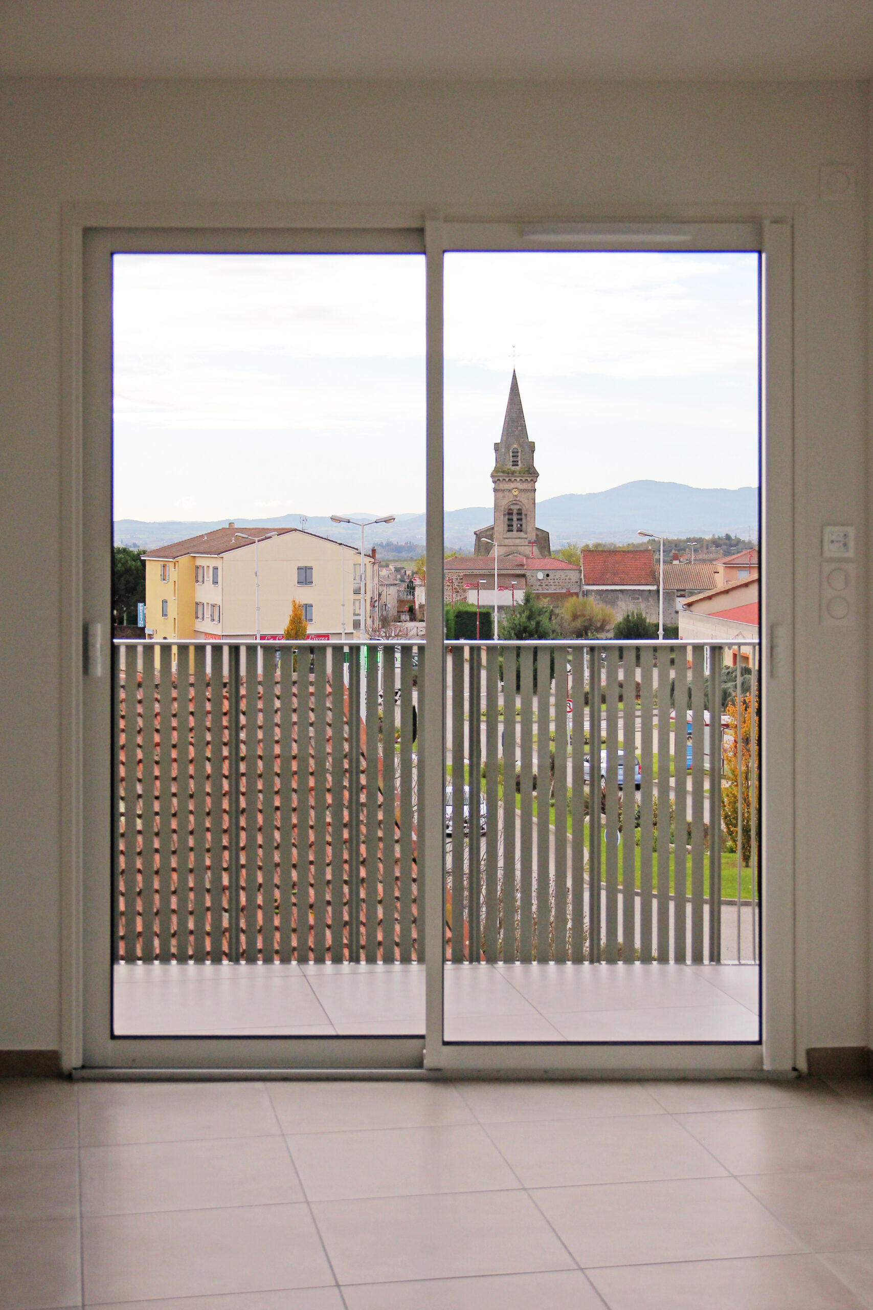 Photo intérieure d'un immeuble d'habitation de 12 logements à Davézieux par Archipolis, architectes à Annonay et Grenoble
